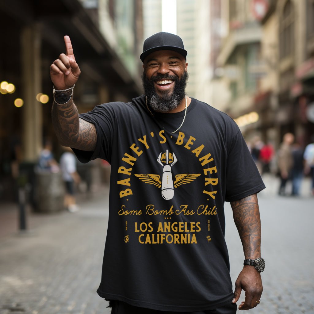 Some Bomb Ass Chili | BARNEY'S BEANERY - Men's Graphic Tee | Black Comfort Colors 1717 T-Shirt - Big Graphic On Front View Of Male Lifestyle Image