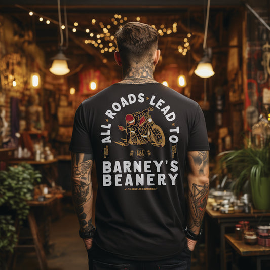 All Roads Lead To | BARNEY'S BEANERY - Men's Graphic Tee | Black Bella+Canvas 3001 T-Shirt - Motorcycle Graphic On Back View Of Male Lifestyle Image