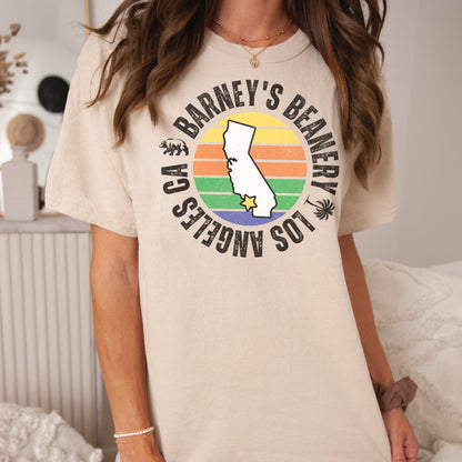 Retro Sunset | BARNEY'S BEANERY - Women's Retro Graphic Tee | Sand Gildan 5000 T-Shirt, Front View Female Lifestyle Image