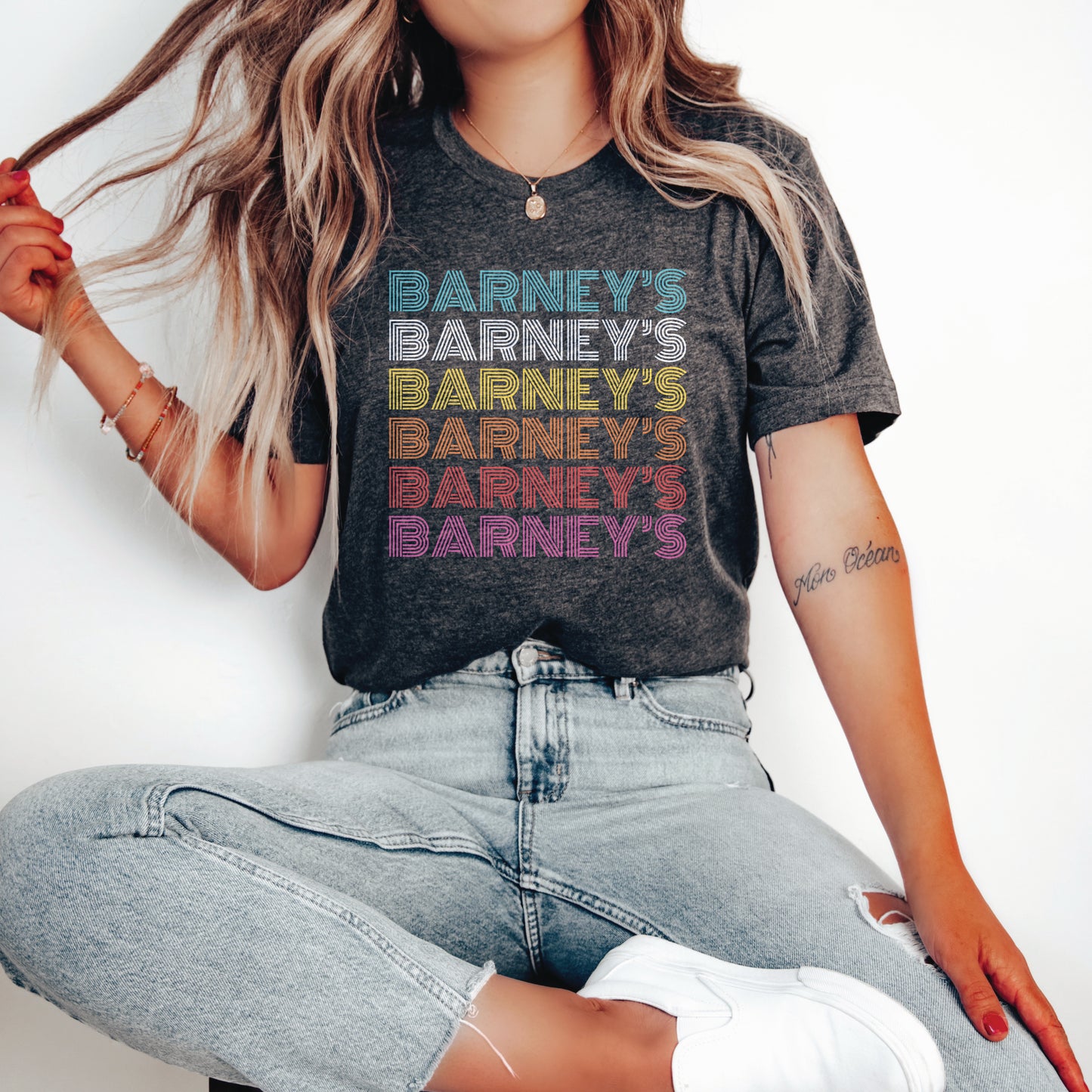 Barney's x6 Retro Hollywood | BARNEY'S BEANERY - Women's Retro Graphic Tee | Dark Grey Heather Bella+Canvas 3001 T-Shirt - Big Graphic On Front View Of Female Lifestyle Image