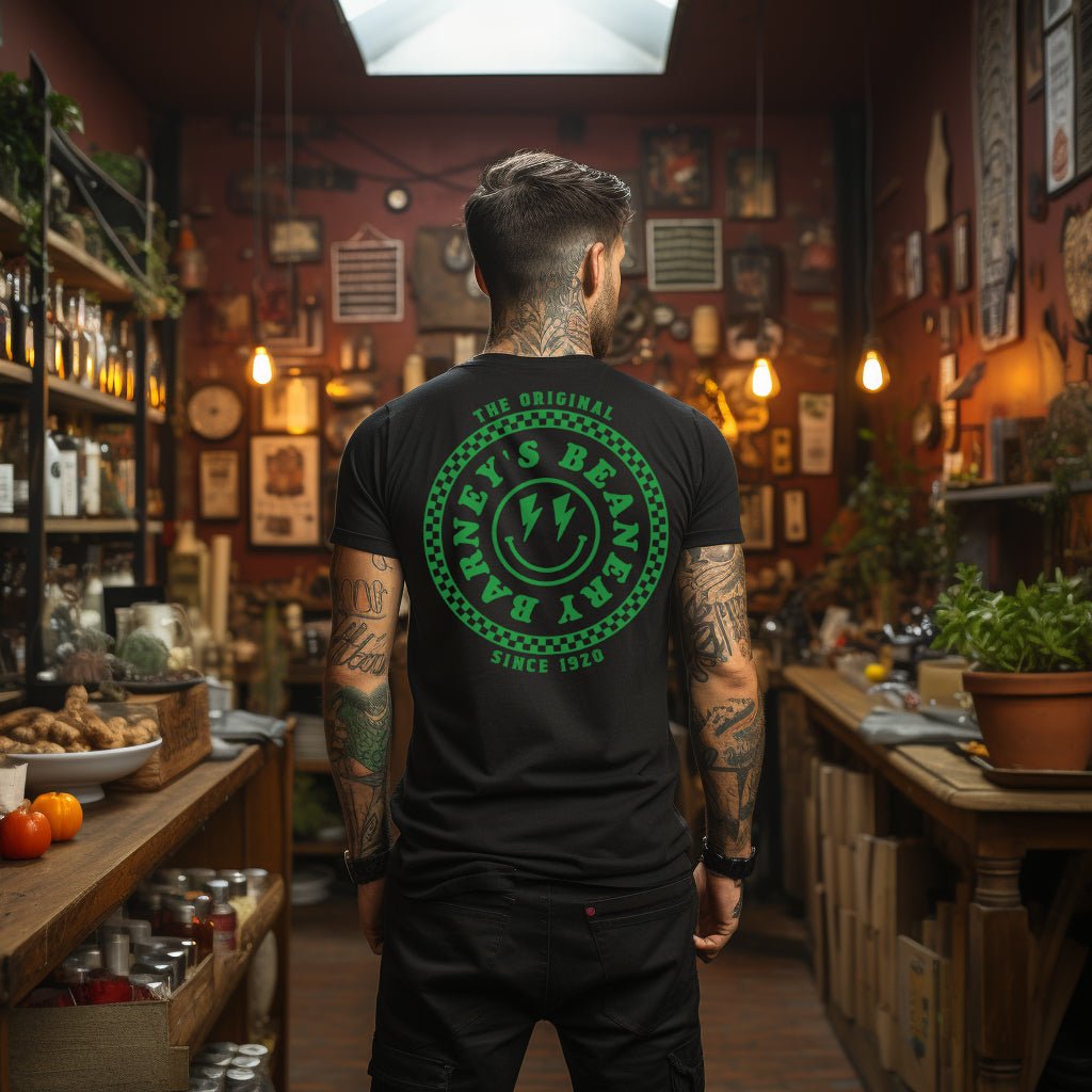 Barney's Energy | BARNEY'S BEANERY - Men's Smiley Face Tee | Big Green Graphic On Black T-Shirt, Back View Of Male Lifestyle Image